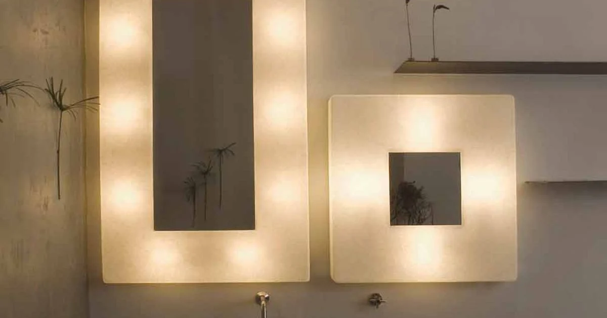 Lampada con specchio a muro di design In-es.artdesign Ego in nebulite