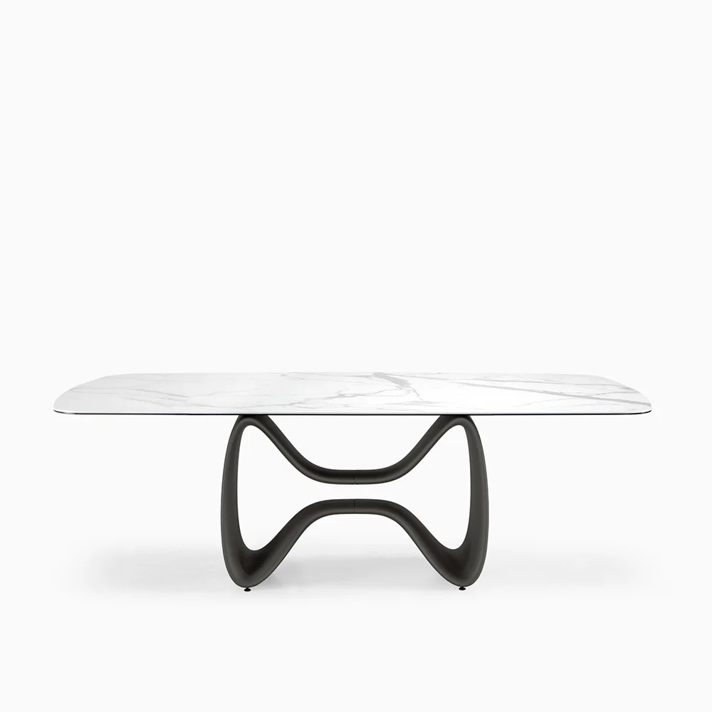 Tavolo Orion di Briolina con piano a botte in vetro ceramica base in poliuretano