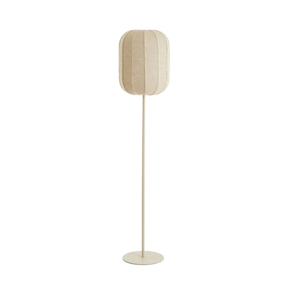 Lenzuola in lino naturale lampada da terra e finitura sabbia